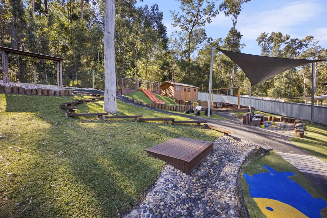 The landscaped play path winding through the playground