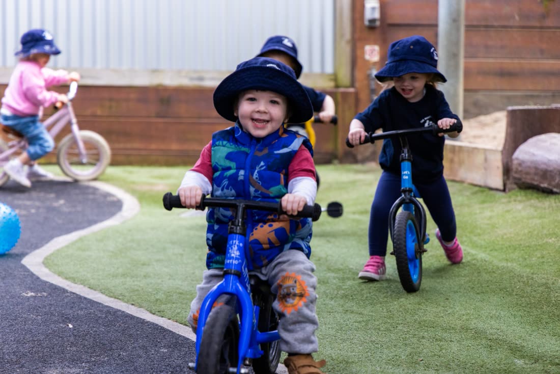Children riding on the bike track